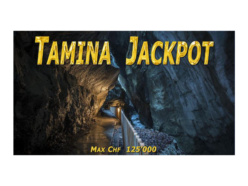 Schummerig beleuchteter Höhlenweg mit „Tamina Jackpot“ in fetter Goldschrift darüber. Darunter weist „Max CHF 125'000“ auf spannende Gewinnmöglichkeiten hin.